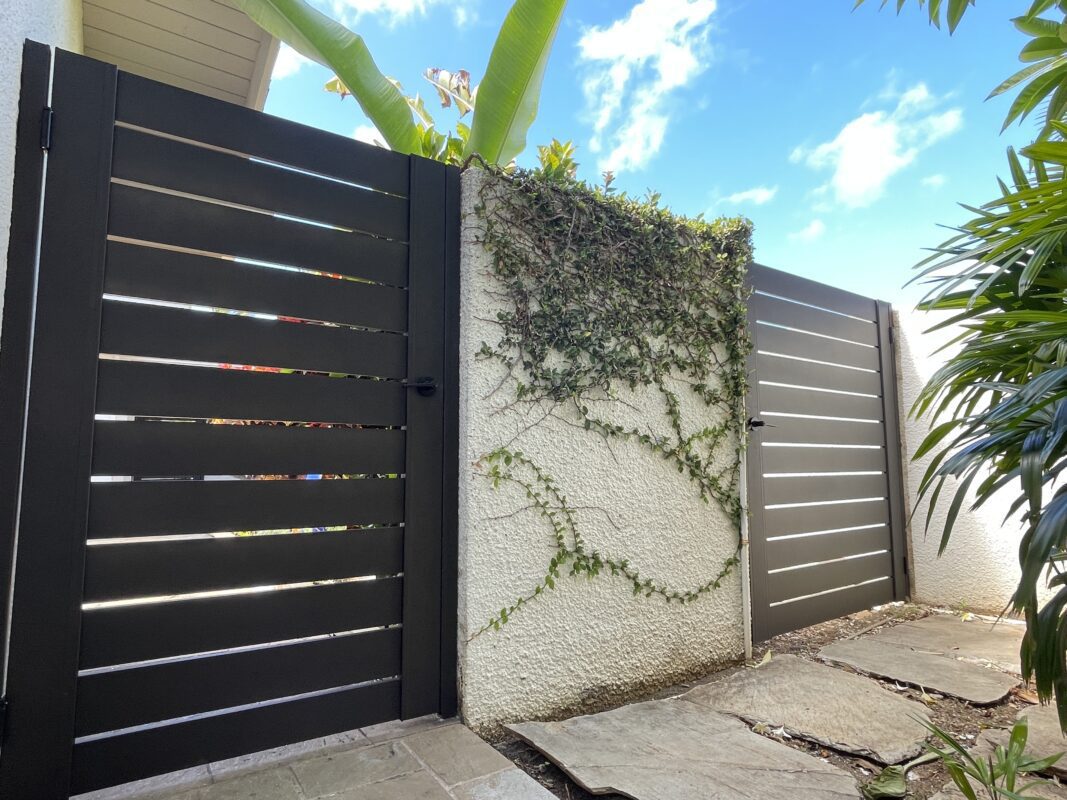 Pair of Aluminum Pedestrian Gates installed in courtyard