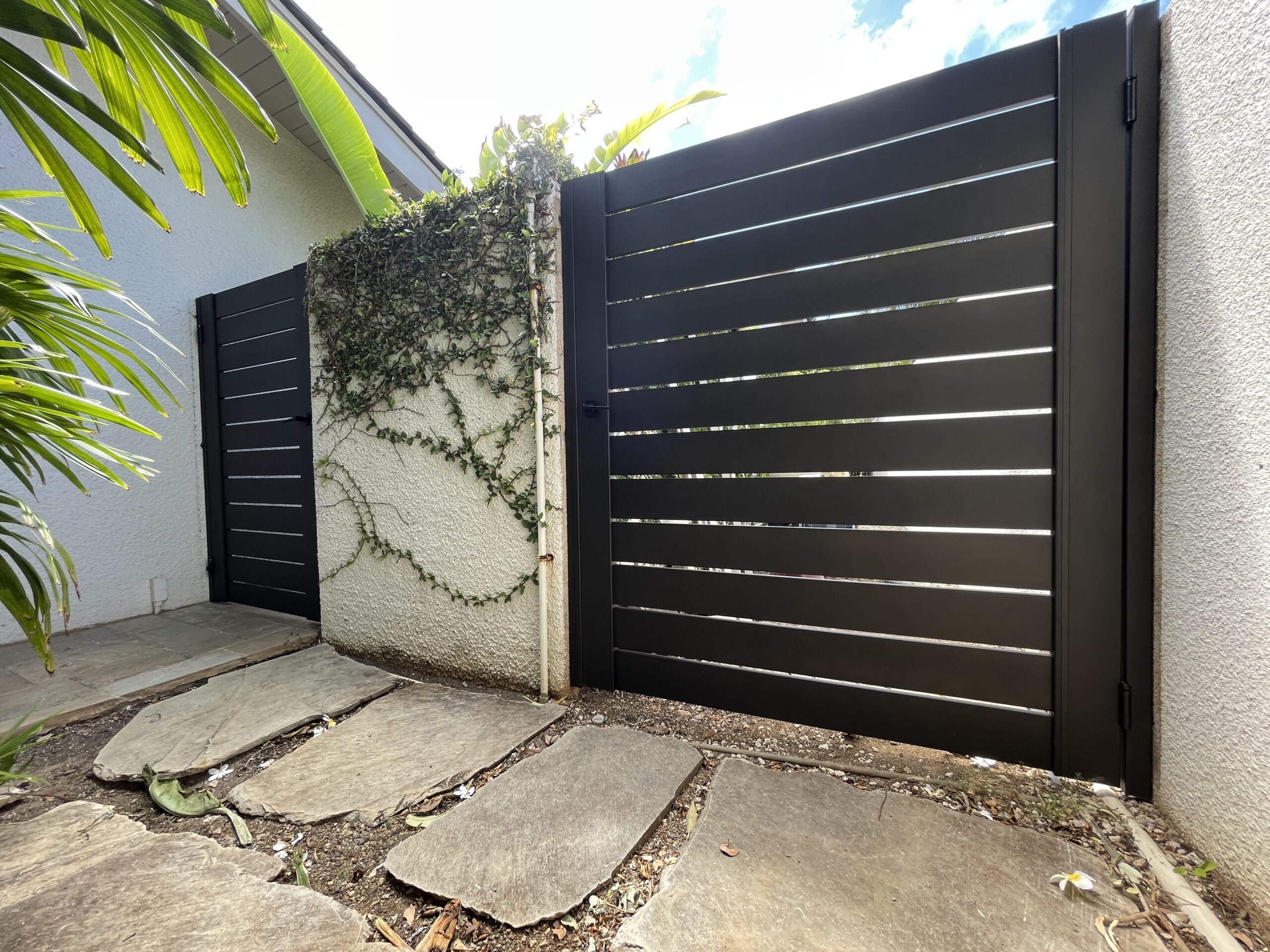 Second view of Aluminum Pedestrian Gates installed in courtyard