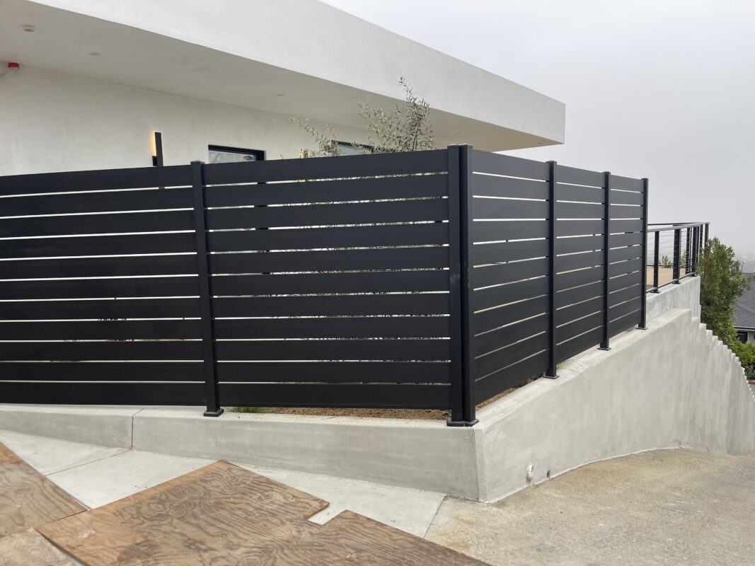 Black Aluminum Panels and Fence installed around home closer view