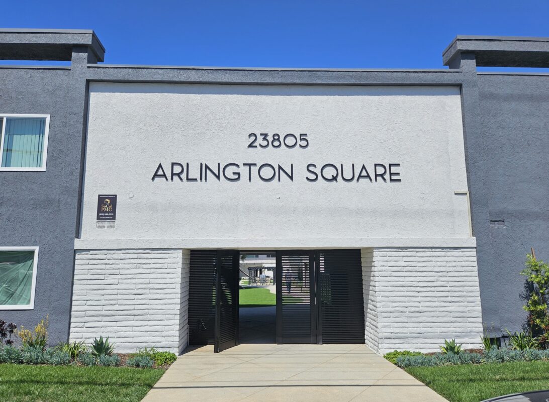 Black aluminum gate installation at Arlington Square entrance in Torrance, CA.