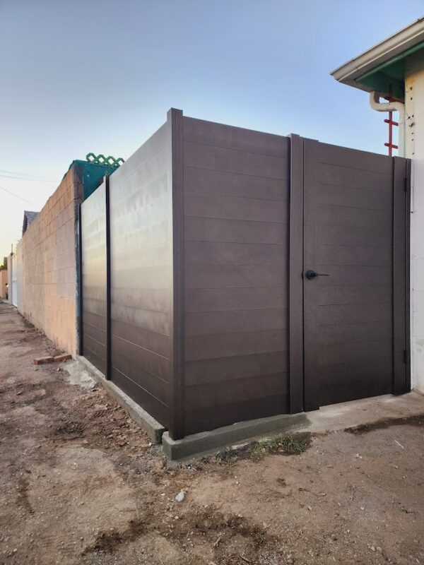 Modern bronze aluminum fence and gate providing security and privacy in Oxnard, CA.