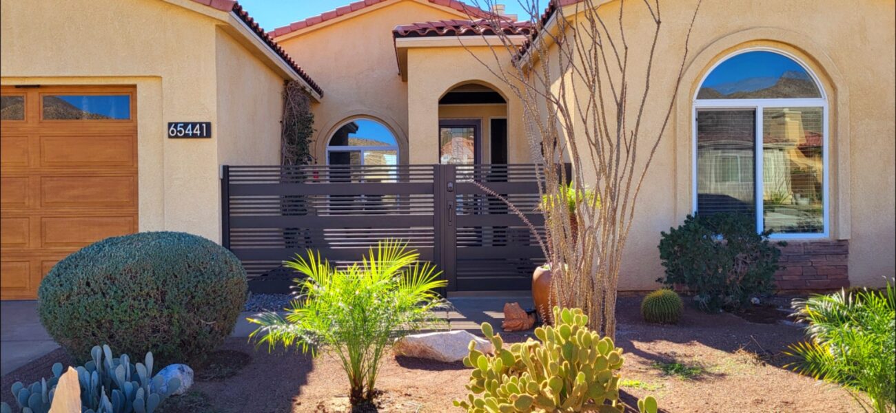 Modern horizontal-slat aluminum fence and gate at a residential entrance in Van Nuys.