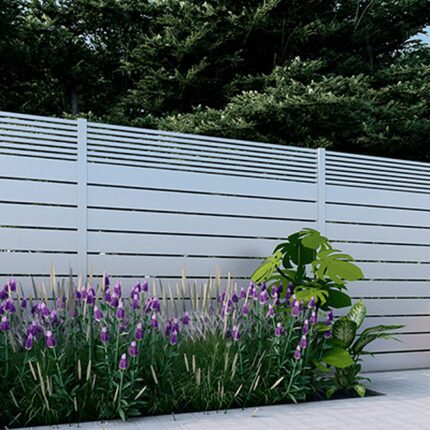 White Dallas Style Alumission aluminum wall topper installed above a garden wall