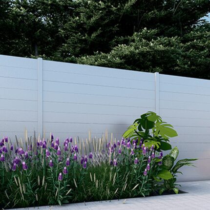 White New York Style Alumission aluminum fence kit installed in a landscaped yard