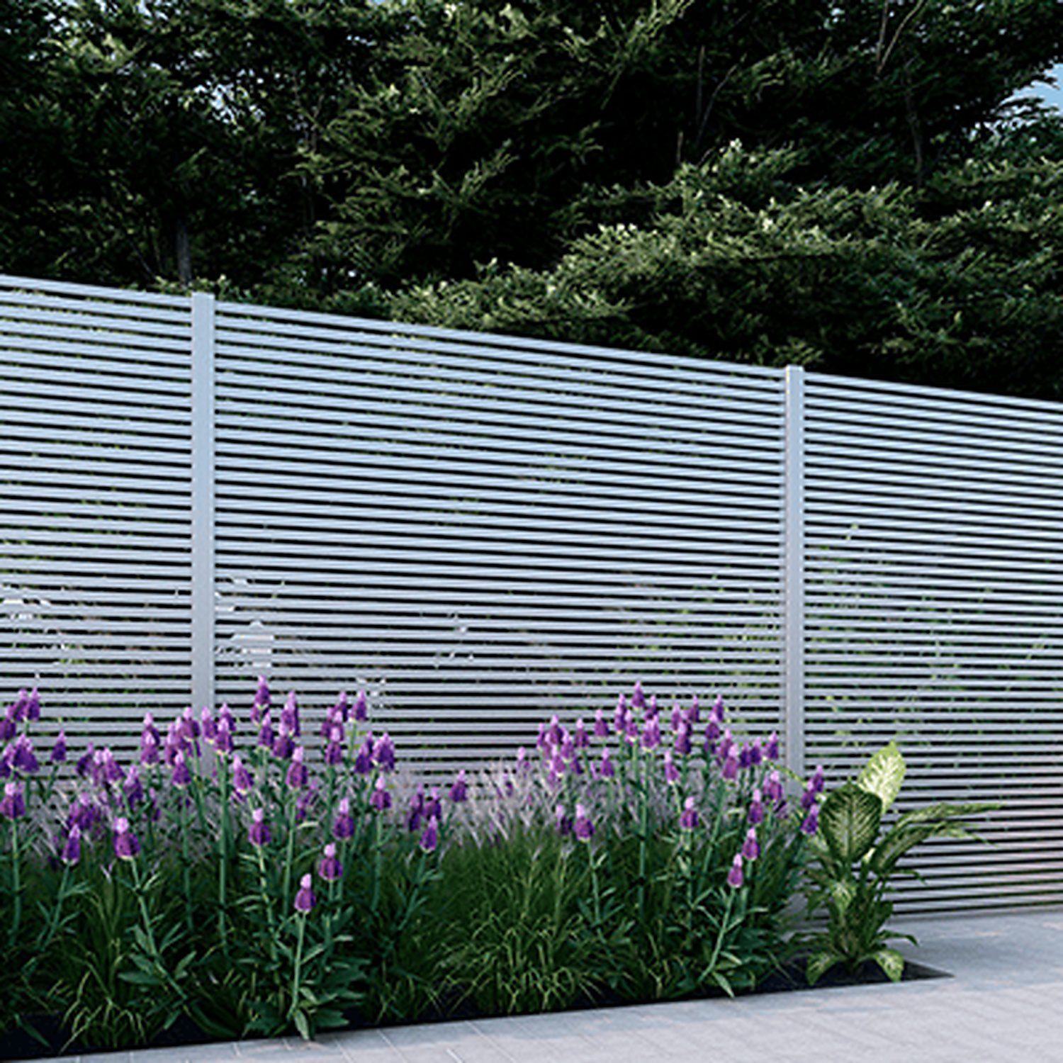 White San Francisco Style Alumission aluminum fence kit installed in a landscaped yard