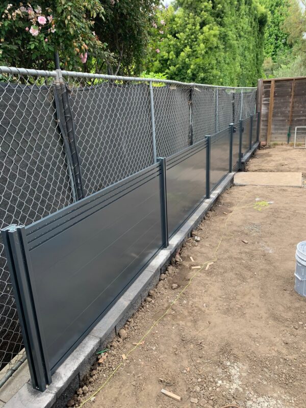 Light grey fences and gates