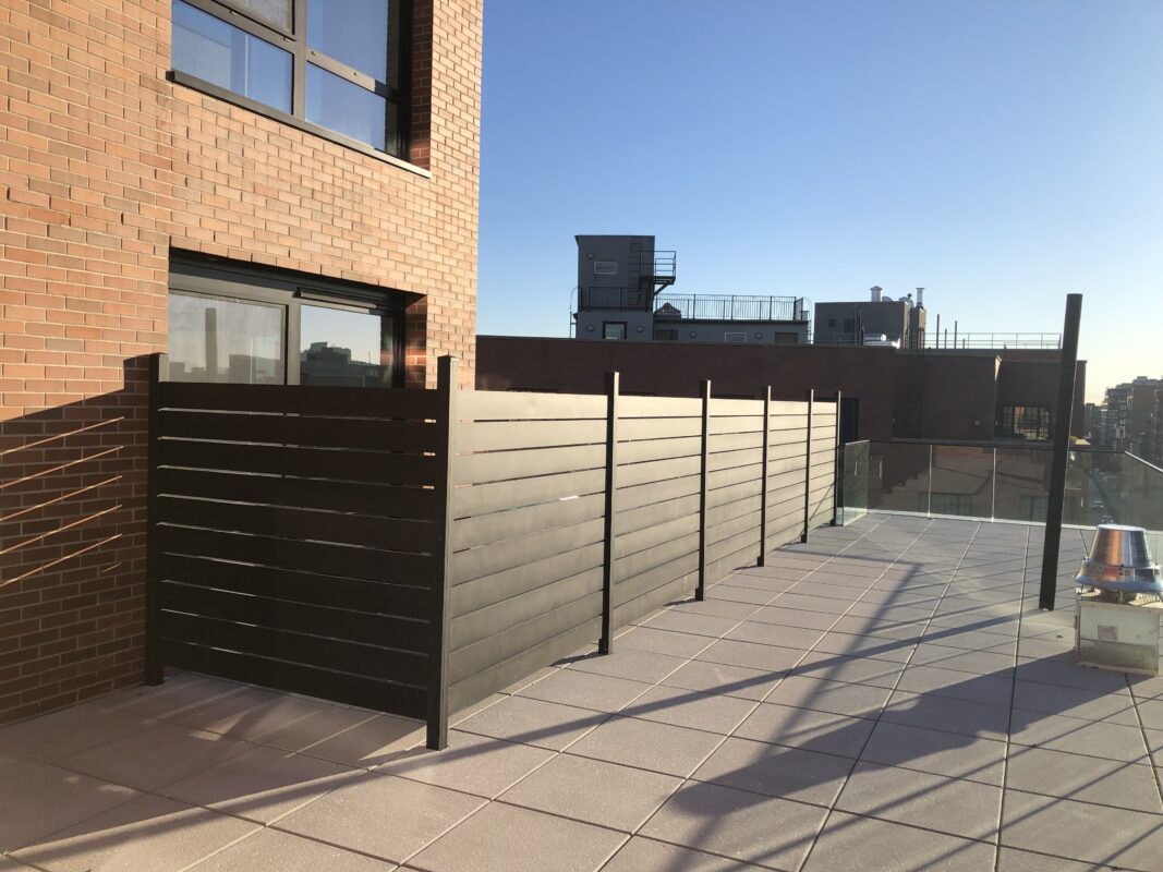 Aluminum fence on a rooftop in Brooklyn