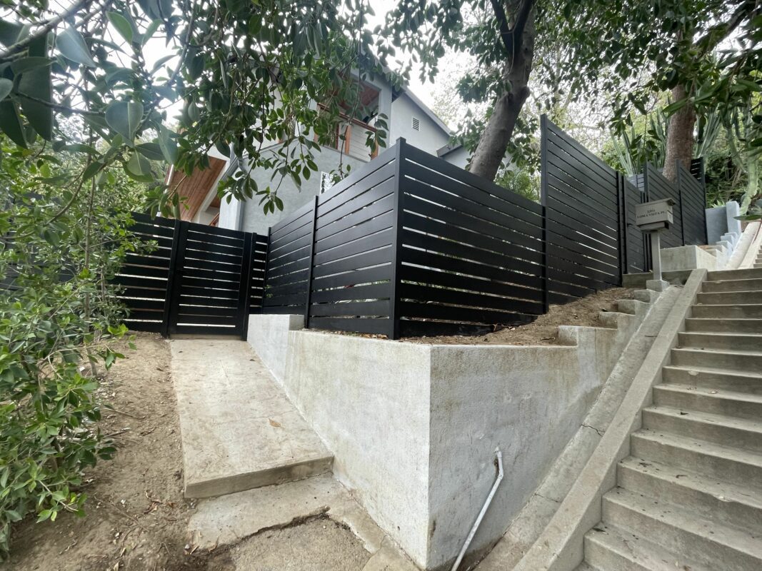 Horizontal aluminum fence on a stiff slope in Silver Lake, CA