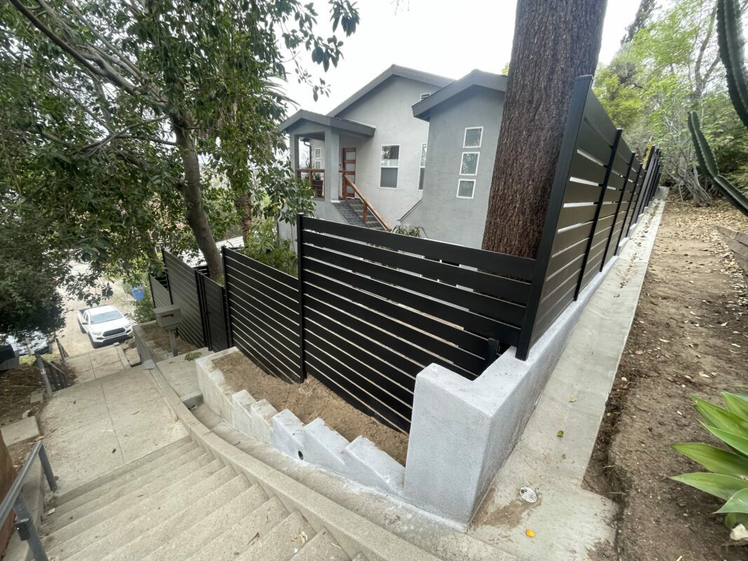 Horizontal aluminum fence on a stiff slope in Silver Lake, CA