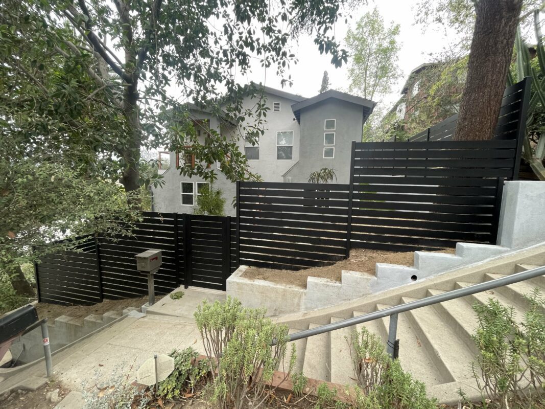 Horizontal aluminum fence on a stiff slope in Silver Lake, CA