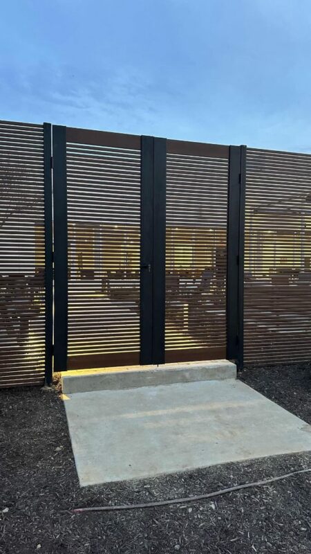 Full View of Wood Finish High Fence and Pedestrian Gate
