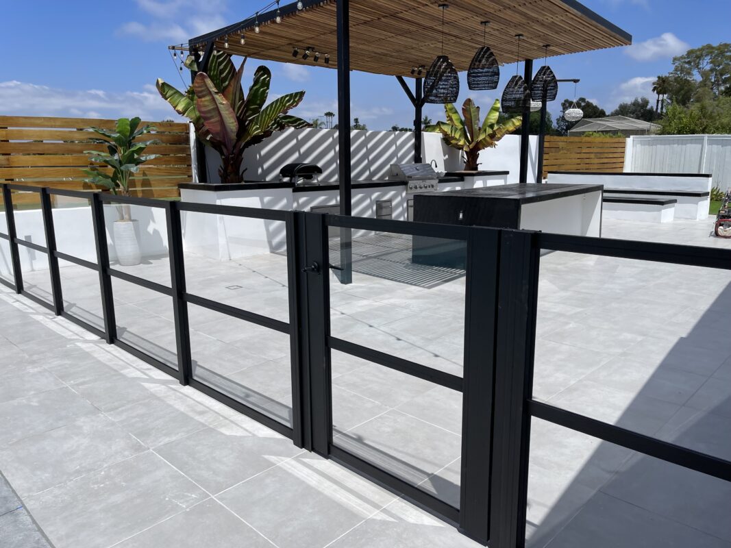 Custom Pool Enclosure with Clear Acrylic Panels Around A Pool