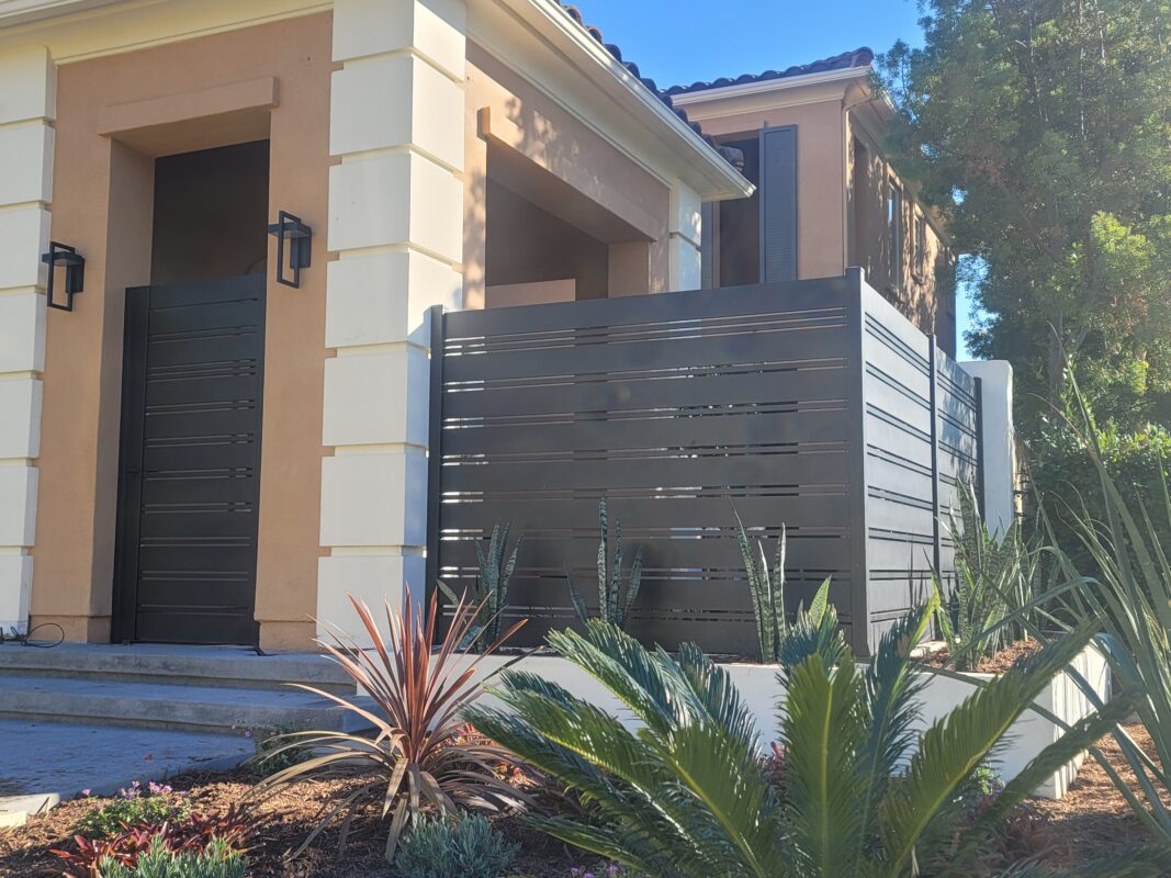 Stylish Aluminum Fencing Enclosing Residential Property