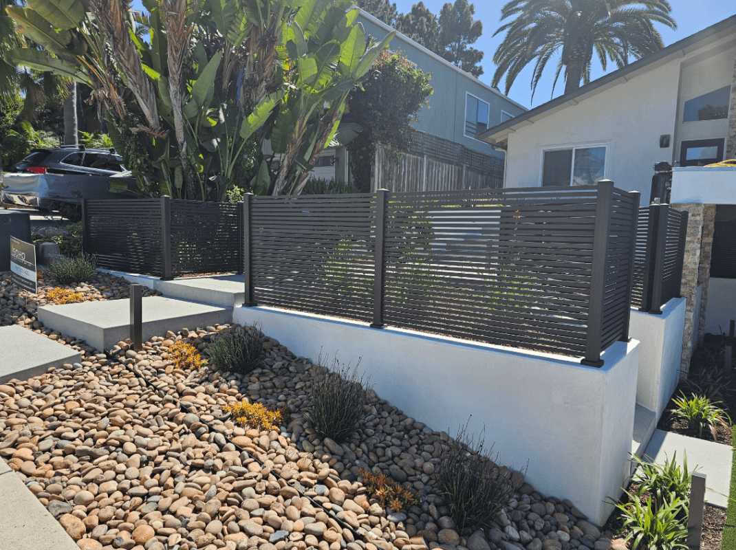San Francisco Style Bronze Fence Surrounding Front of Home.