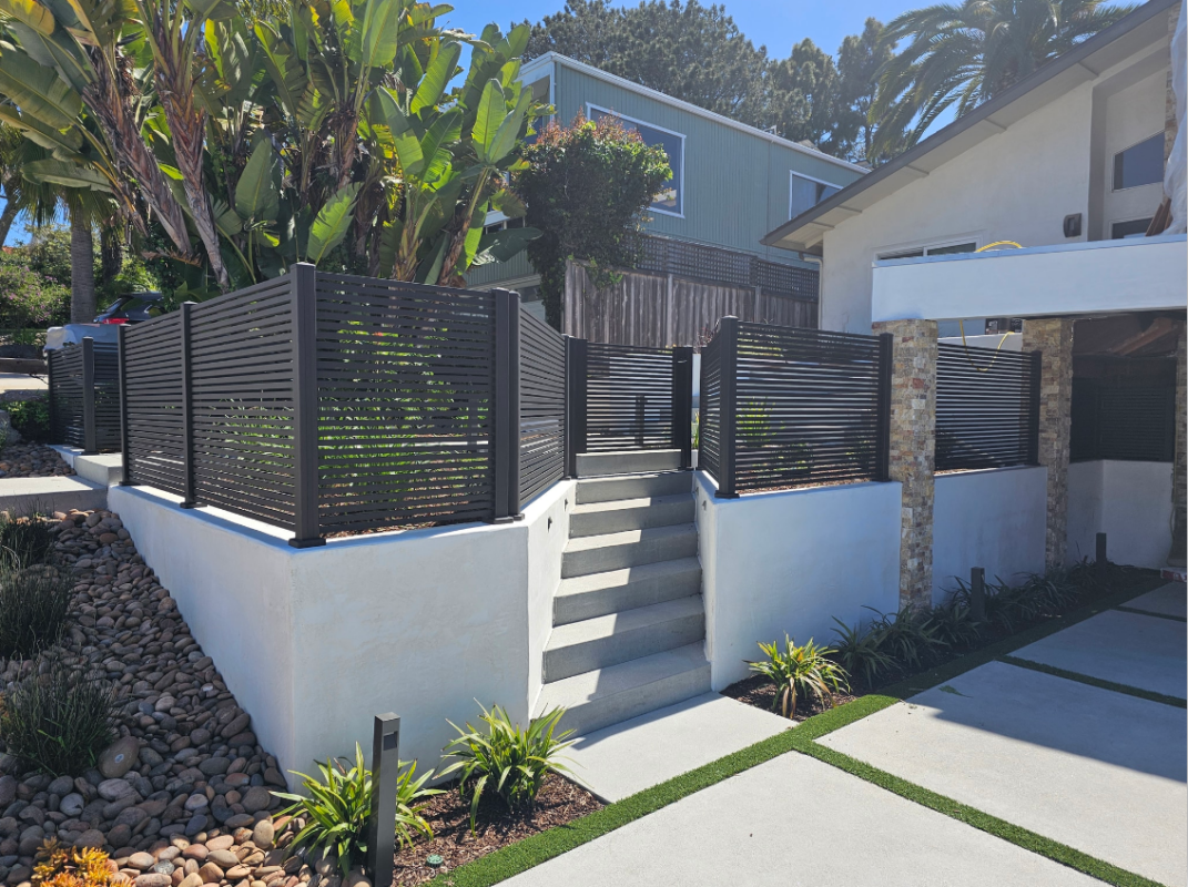 San Francisco Style Bronze Pedestrian Gate and Fence Surrounding Front of Home.