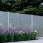 White San Francisco Style Alumission aluminum fence kit installed in a landscaped yard